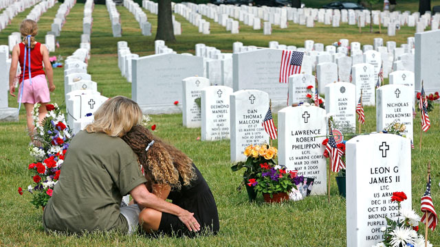 gty_memorial_day_cemetary_family_thg_120524_wmain.jpg