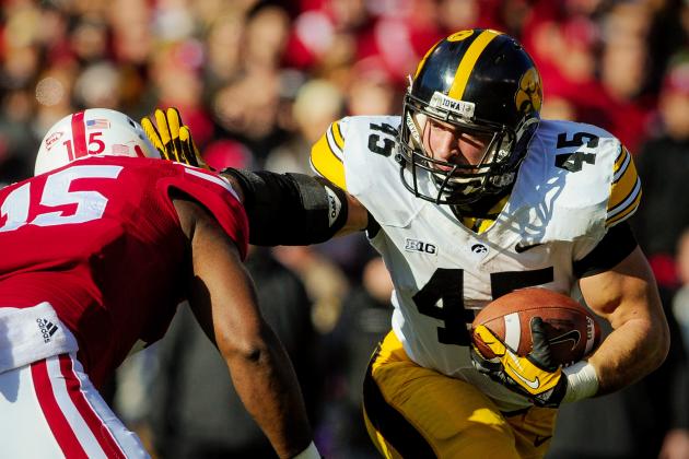 hi-res-452489759-fullback-mark-weisman-of-the-iowa-hawkeyes-runs-through_crop_north.jpg