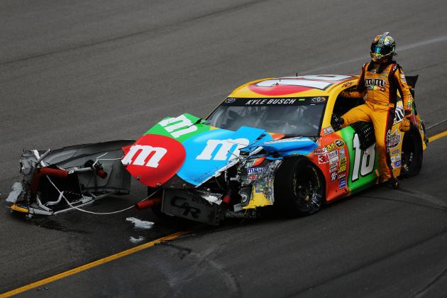 hi-res-183457325-kyle-busch-driver-of-the-m-ms-toyota-climbs-from-his_crop_north.jpg