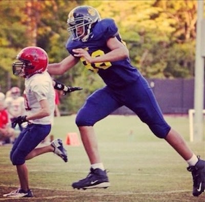 6-foot-7-Isiah-Stokes-in-an-8th-grade-football-game-Instagram.jpg