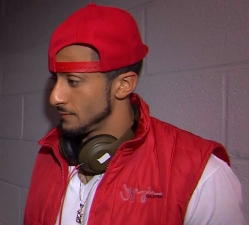 colin-kaepernick-backwards-hat.jpg