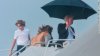 180125124929-trump-melania-umbrella-01-12-2018-large-169.jpg
