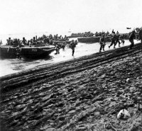 U.S._Marines_storm_ashore_on_Guadalcanal,_7_August_1942_(80-CF-112-5-3).jpg U.S._Marines_storm_ashore_on_Guadalcanal,_7_August_1942_(80-CF-112-5-3).jpg