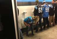 woman-uses-urinal-at-mens-restroom.jpg