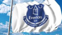 82137661-waving-flag-with-everton-fc-football-club-logo-editorial-3d-rendering.jpg