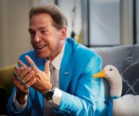 Nick_Saban_teams_with_the_Aflac_Duck.jpg