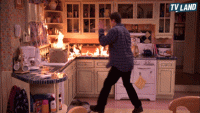 Raymond - Ray sets kitchen on fire.gif