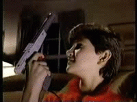 kid-playing-duck-hunt-nintendo-celebrating-1370559303c.gif