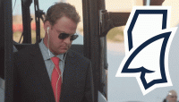 Kiffin exits bus.gif