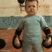 toddler with gloves.gif