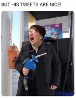 woman-holding-gas-pump.jpeg