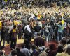 Fans storm court.jpg
