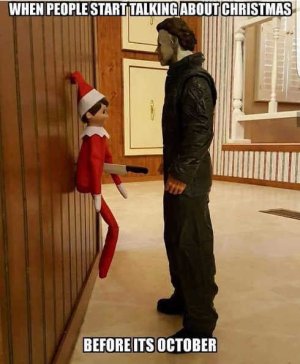 when-people-start-talking-about-christmas-before-october-michael-myers-stabbing-elf-on-shelf.jpg