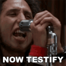 now-testify-zack-de-la-rocha.gif