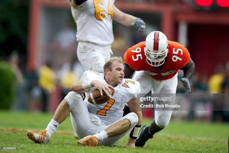 Casey Clausen vs. Miami_helmet ripped off.jpg