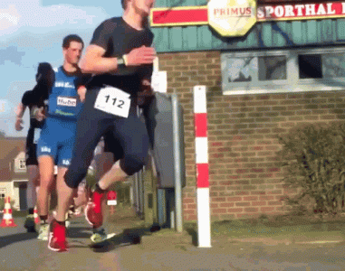 runner-smashes-nuts-into-pole-runner.gif