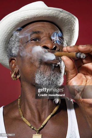 man-in-fedora-smoking-cigar.jpg