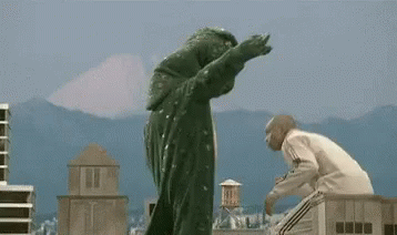 punch-godzilla-gif-4502887.gif