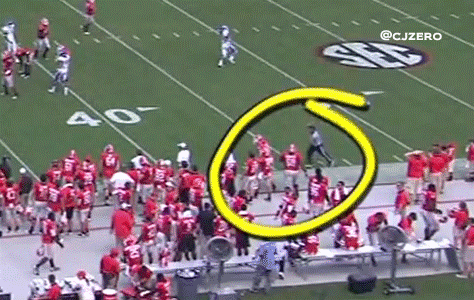 georgia-football-player-runs-into-ref.gif
