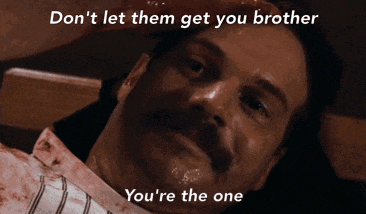 a man with a mustache is laying down and says  don 't let them get you brother you 're the one't let them get you brother you 're the one