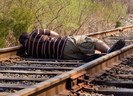 Man%20asleep%20on%20railway(1).jpg