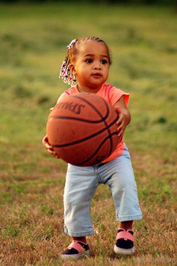 Cute-Baby-Holding-Basketball.jpg