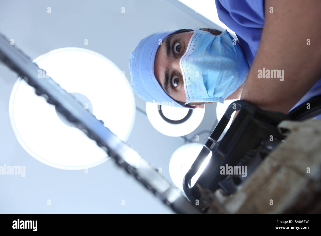 crazy-surgeon-with-chainsaw-BA0G6W.jpg