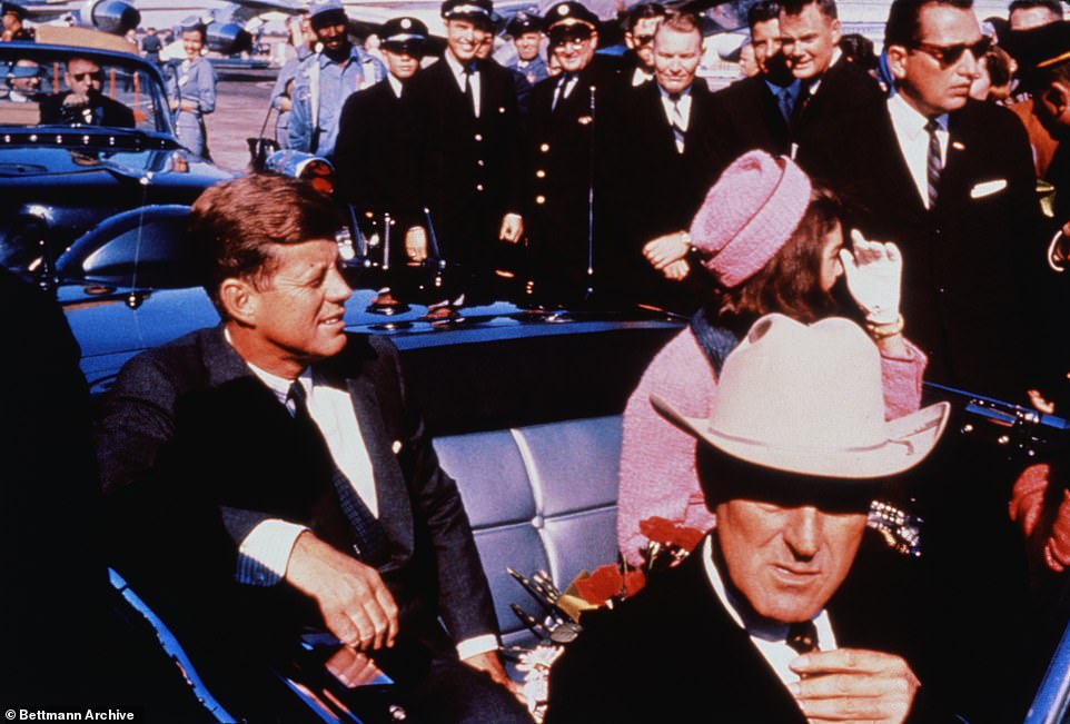 51825489-10312905-JFK_and_Jackie_Kennedy_are_pictured_in_his_car_in_Dallas_Texas_o-a-20_1639589586728.jpg