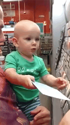 adorable-little-boy-gets-super-excited-while-helping-pick-out-paint-colors-at-home-depot.gif