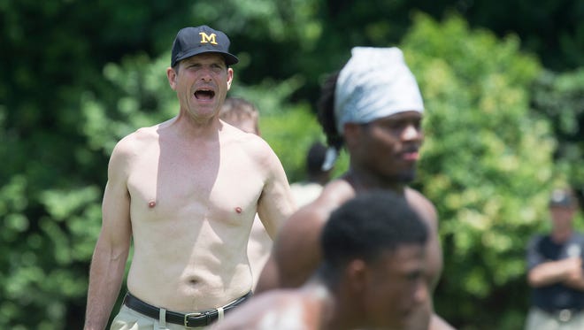 635691226945789850-AP-Michigan-Harbaugh-Camp-Fo.jpg