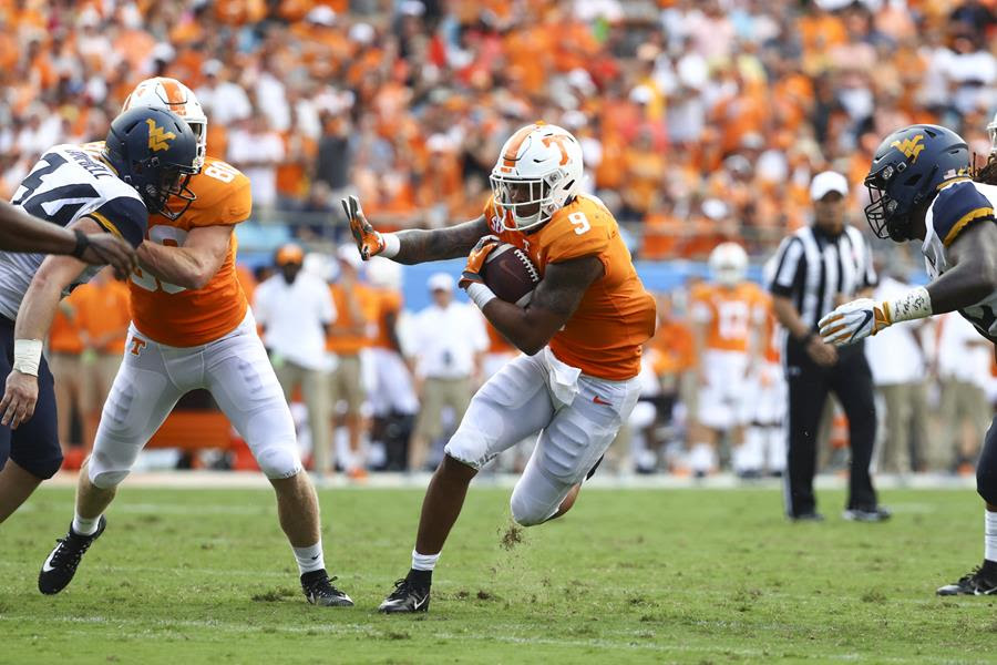 Jordan Shines as Vols Fall to #17 West Virginia in Opener