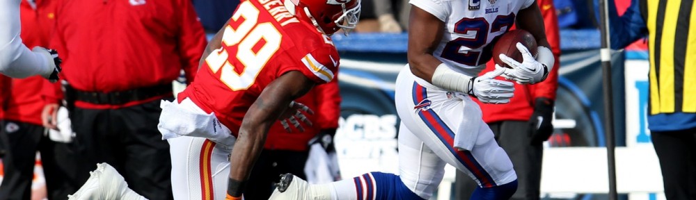 Nov 3, 2013; Orchard Park, NY, USA; Buffalo Bills running back Fred Jackson (22) runs the ball while Kansas City Chiefs strong safety Eric Berry (29) tries to make the tackle during the second half at Ralph Wilson Stadium. Chiefs beat the Bills 23 to 13. Mandatory Credit: Timothy T. Ludwig-USA TODAY Sports